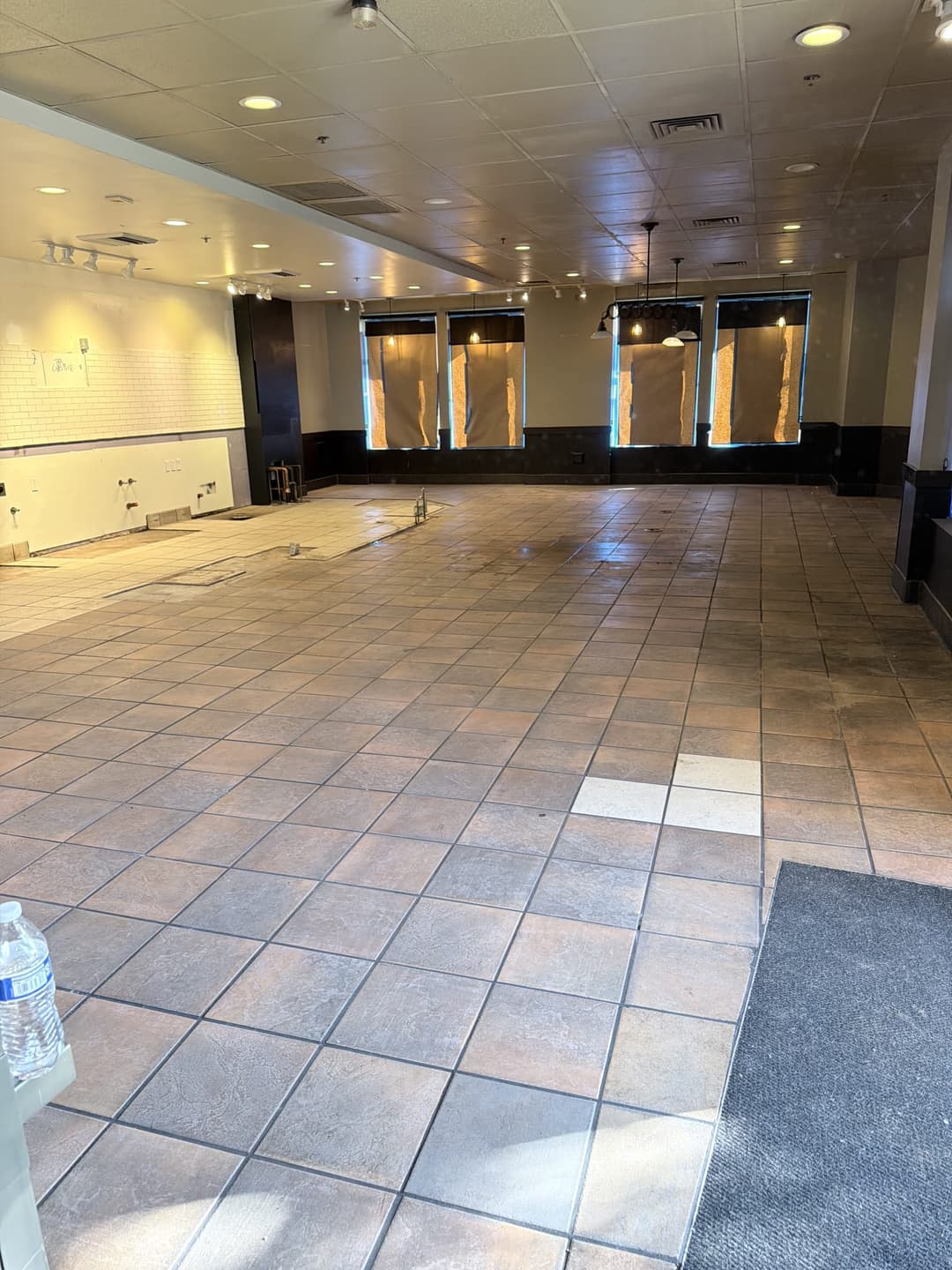 Empty commercial interior after demolition and full junk removal service